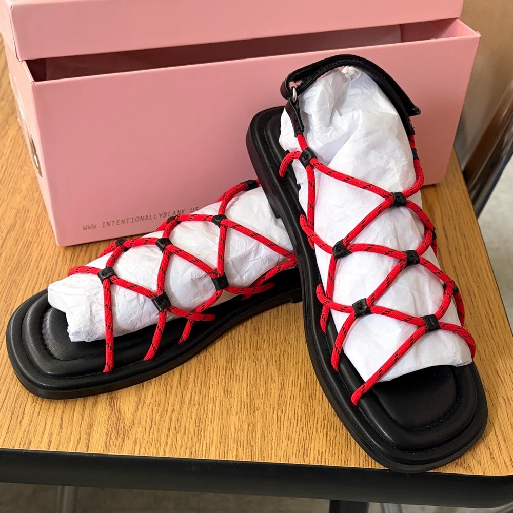 INTENTIONALLY BLANK Black Sandals with Red Rope Lattice